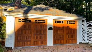 Stylish wooden garage doors on a residential home.